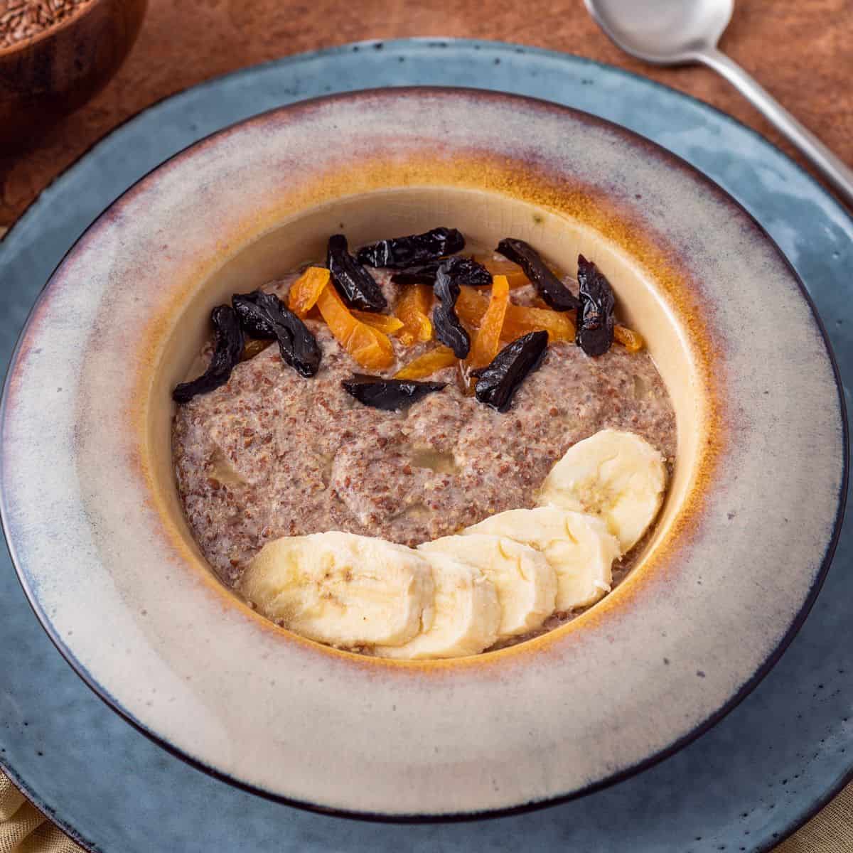 Healing recipe of no oat vanilla porridge served in a ceramic bowl, gluten free recipe for gut healing. 