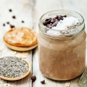 Healthy Cookie Dough Overnight Oats recipe in a mason jar with chia seeds. 2