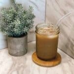Homemade Starbucks brown sugar oat milk shaken espresso recipe in a mason jar.