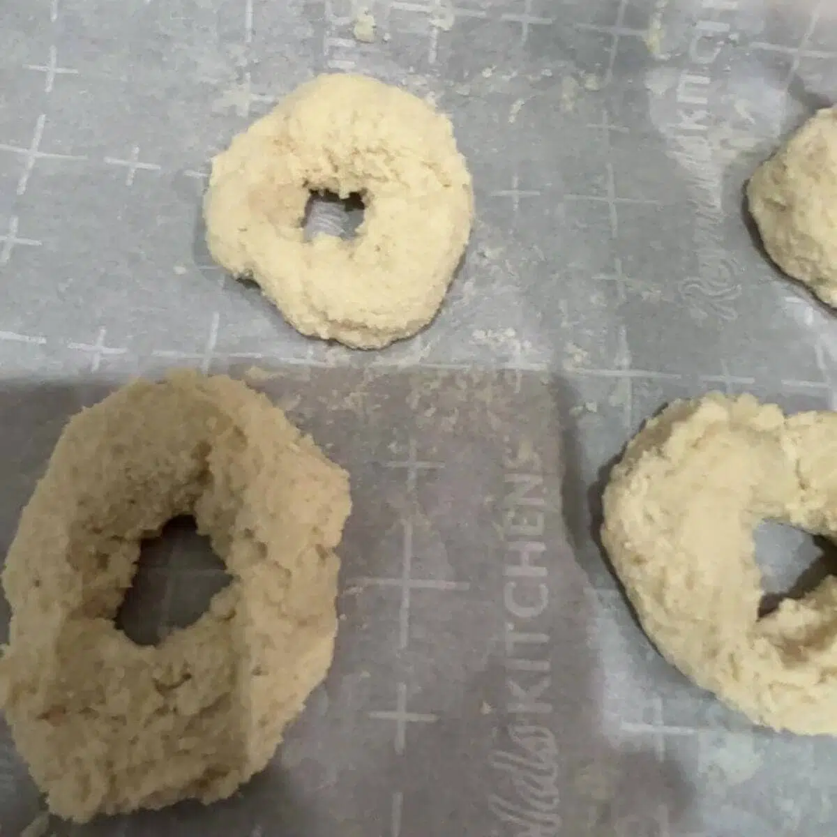 Form the bagel dough into a log and divide into 6 portions. 