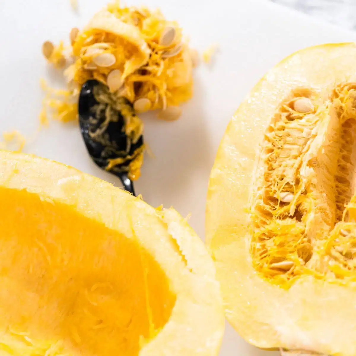 How to scoop out seeds from a spaghetti squash and make noodles