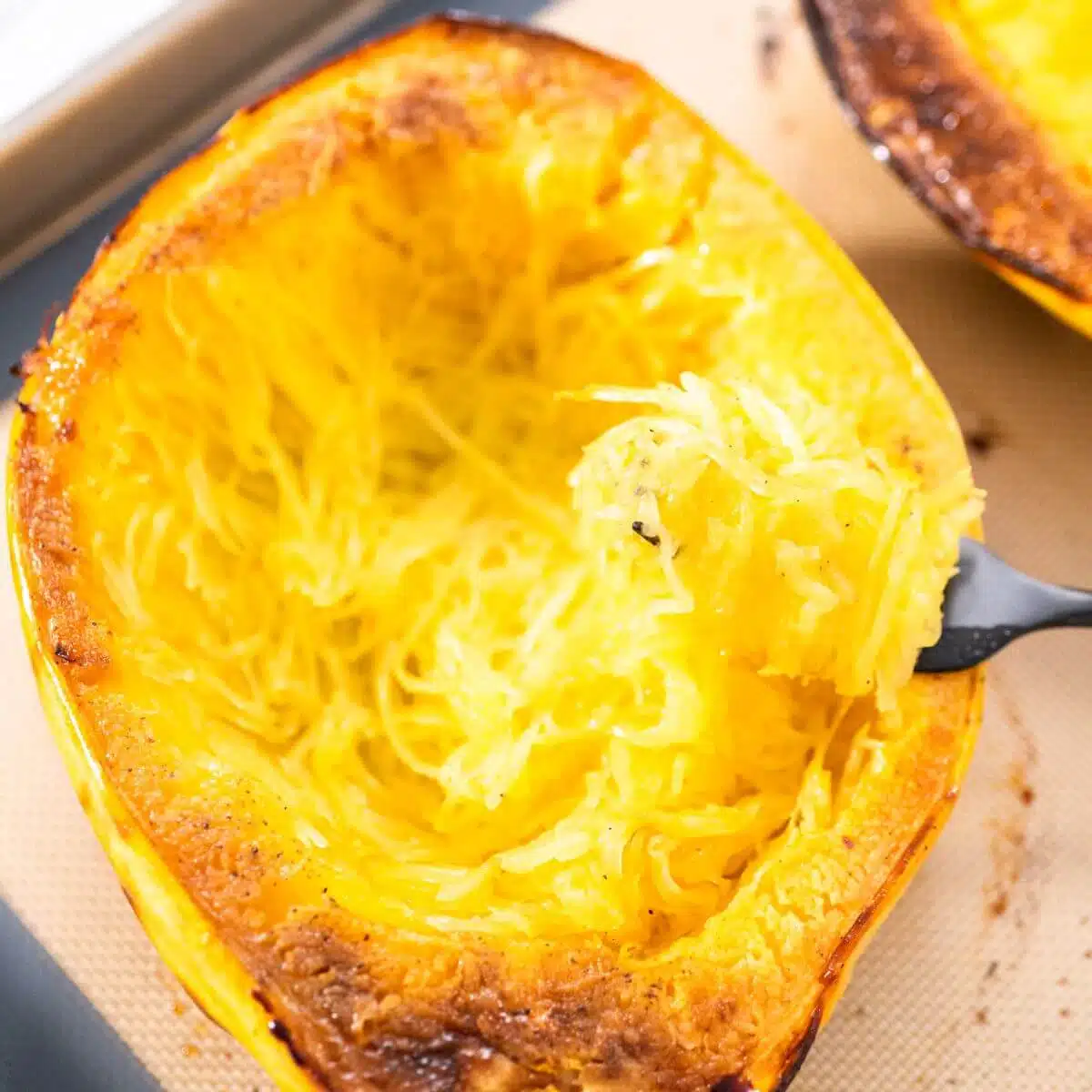 How to scoop out seeds from a spaghetti squash and make noodles