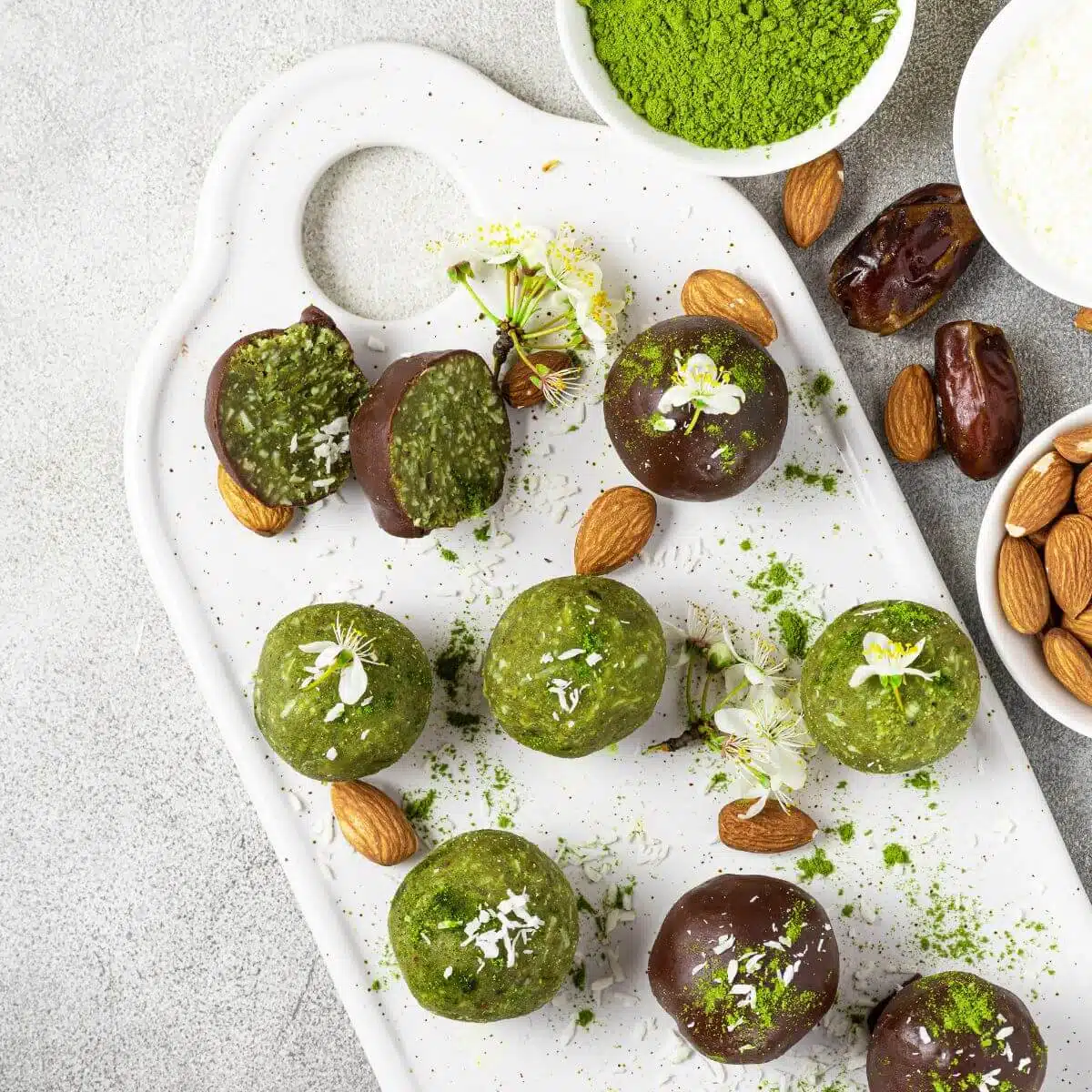 matcha energy bites balls in chocolate glaze.