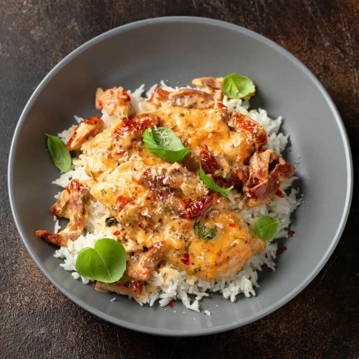 Sun dried tomato chicken over rice