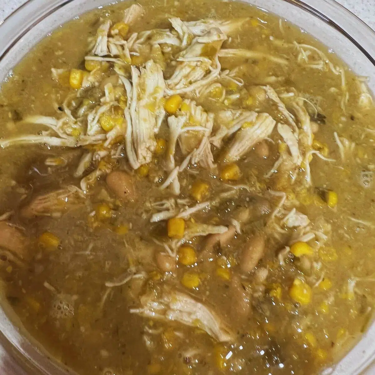 Ladle the chili into bowls and garnish with your favorite toppings